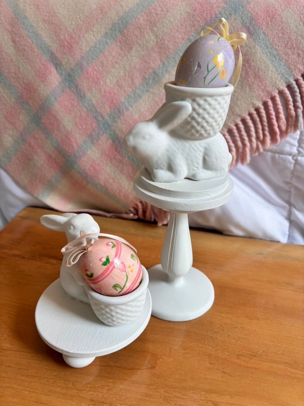 Set of Thrift flip ceramic Easter Bunny egg holders on pedestals